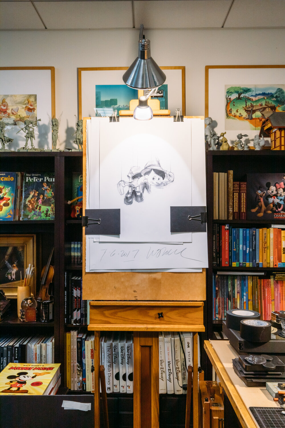  This is a charcoal drawing of Pinocchio by Disney Artist Ken Shue, spotted behind the scenes in the offices at Disney Publishing Worldwide, was made for a Disney cast member celebrating their anniversary with The Walt Disney Company. 